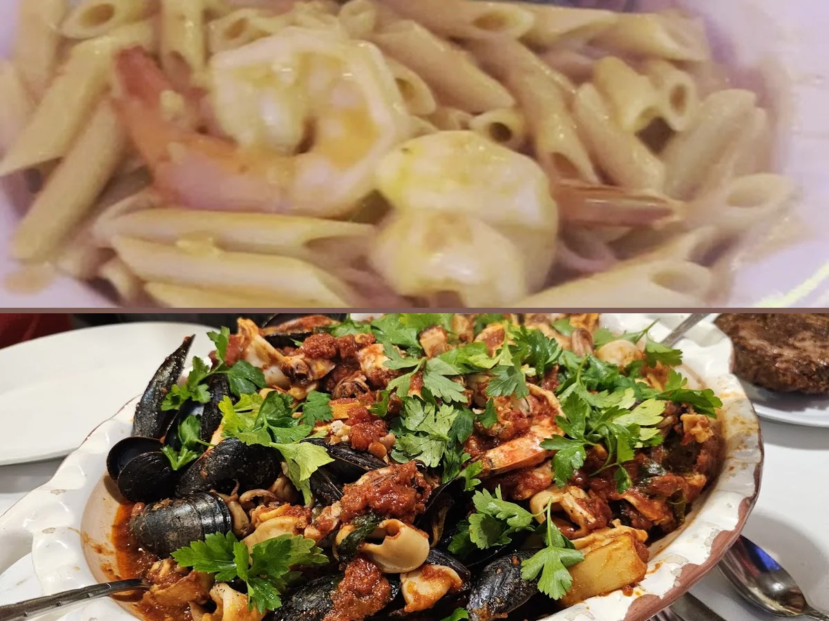 Classic Italian-American dishes on a busy restaurant table.